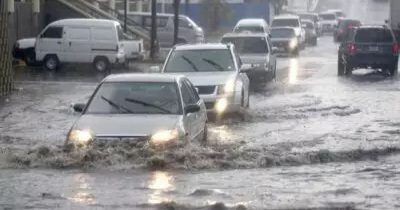 Santo Domingo y el Distrito Nacional son colocados en alerta roja debido a los copiosos aguaceros