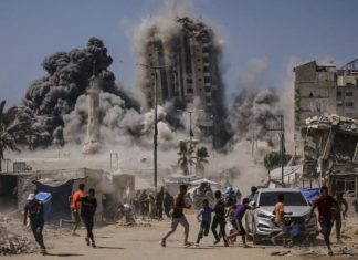 Israel apunta a los edificios altos de Gaza y le insta a los hambrientos a ir a zona humanitaria que designó en el sur
