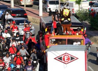 Con caravana triunfal, escogidistas celebran corona 18 en las calles de la capital