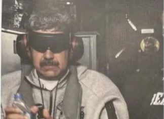 Donald Trump publica foto de Nicolás Maduro detenido: Ojos tapados, ropa gris y una botella de agua en la mano derecha