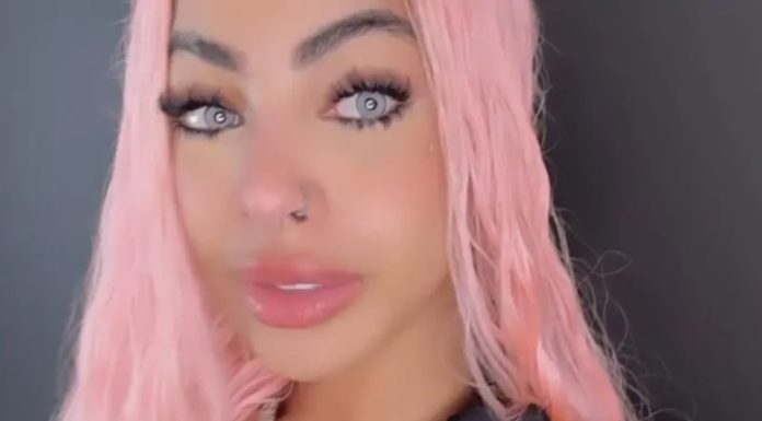 Policía Nacional detiene a Yailin y le ocupa dos armas de fuego en Santo Domingo Este